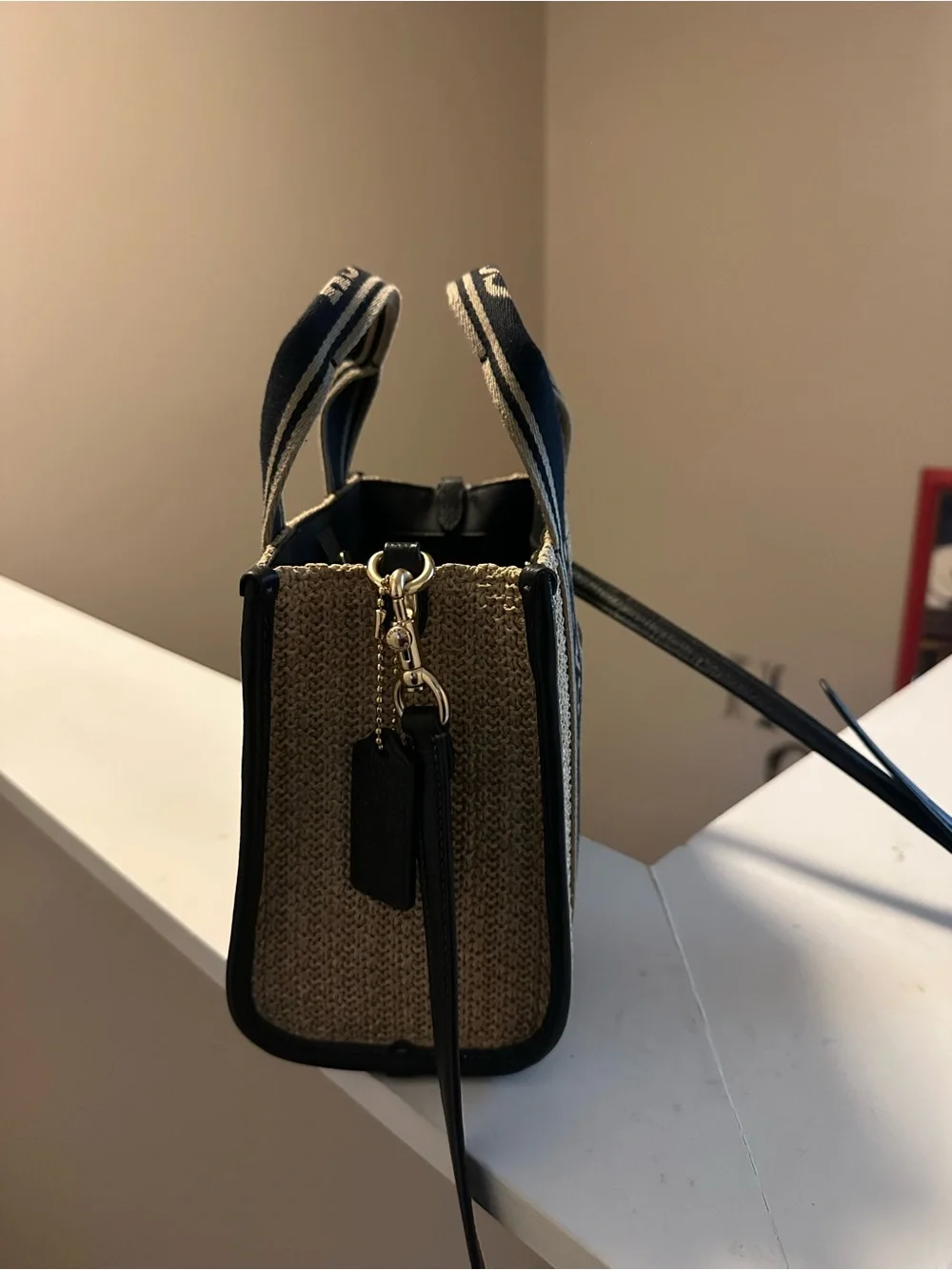 COACH Natural Straw Tote with Black Trim and Logo Webbing